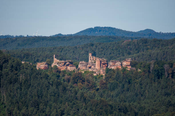 The photo was postprocessed by increasing the contrast, desaturating the colors, adding a sepia cast. Finally a strong vignetting was added.Ruined tower in dark mood sky. The name of the castle is Ch