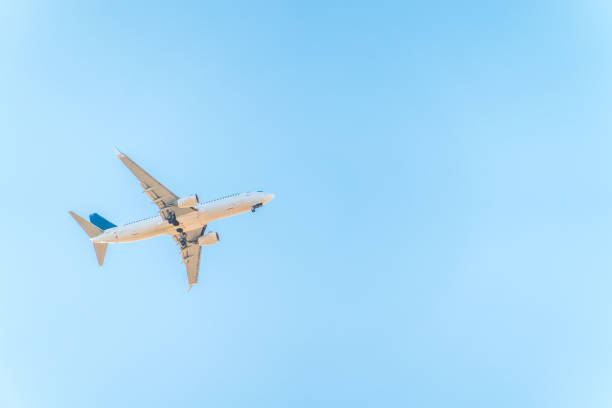 istock Airplane before landing in blue sky, Boeing 737-800 2098079647