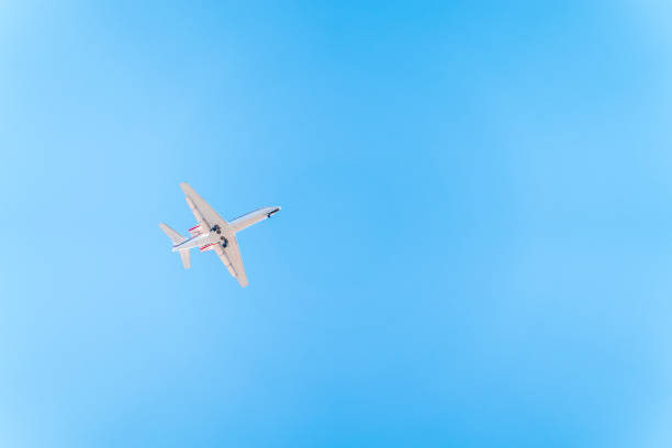 istock Airplane Cessna 680 before landing in blue sky. 2098087236