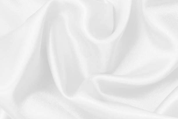 istock White fabric texture for background and design, beautiful pattern of silk or linen. 2098089779