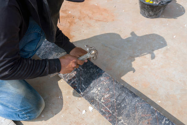 istock Construction workers in black sun protection suits work in the sunlight during the daytime. Use a hammer to drive nails into a piece of wood to make a construction model. 2098110952