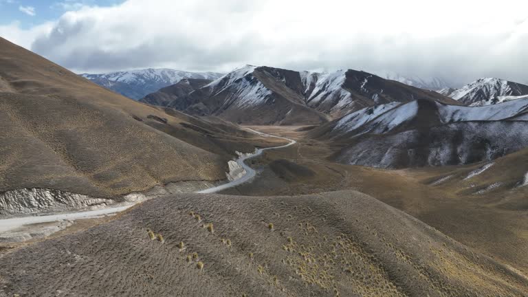 Snow capped mountains in Lindis Pass on the South Island of New Zealand.