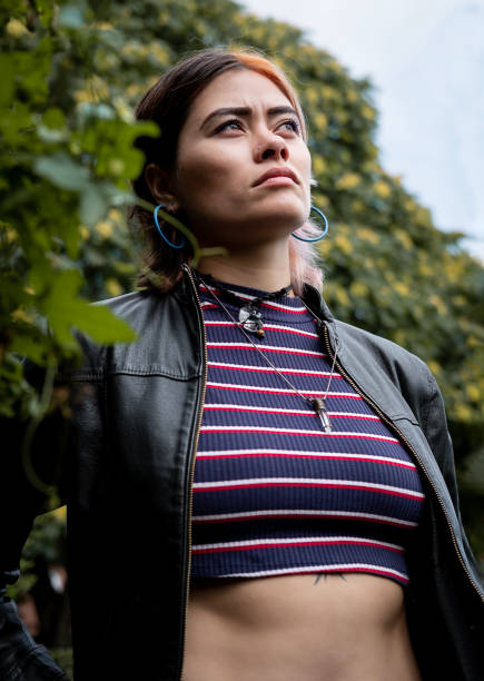 istock Confident female model looking away with confident. 2098128102
