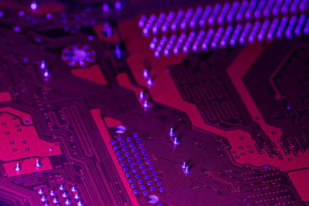 istock red computer electronic circuit board with blue illumination. closeup. selective focus. 2098139394