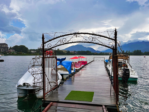 Kawaguchiko, Shizuoka Prefecture, Japan - August 12, 2023: Japan's Iconic Landscape: Kawaguchiko Five Lakes Pier and Mount Fuji Views