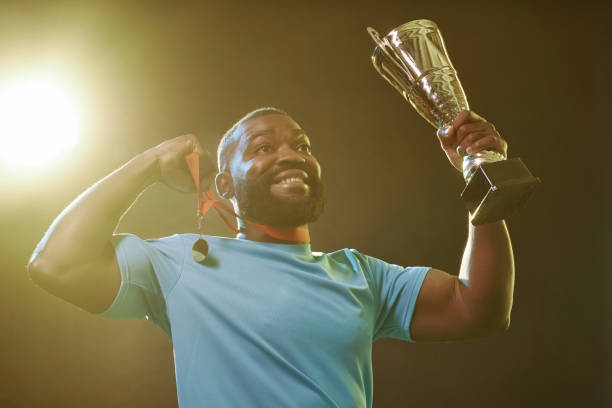 istock Black Sportsman Celebrating Victory 2098154377
