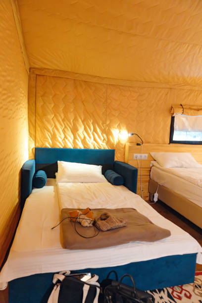 istock Bedroom interior in glamping. A cozy tent house. 2098160304