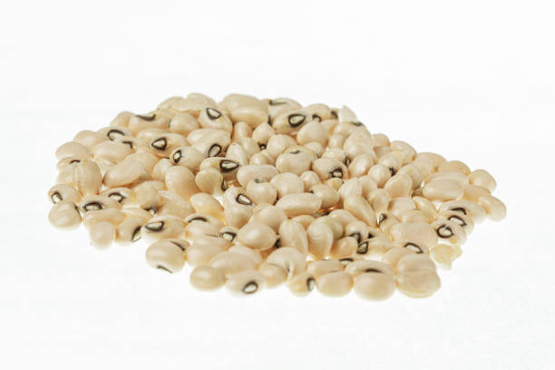 Close up of Black Eyed Peas also known as Black Eyed Beans isolated on a white background with copy space