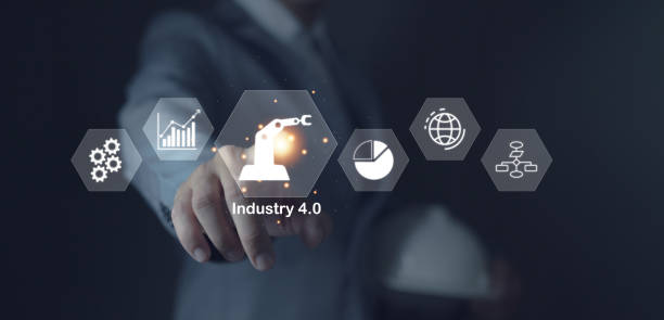 istock Businessman touching Industry 4.0 icons in virtual interface, physical system, IOT, intellectual computing industry. 2098264369