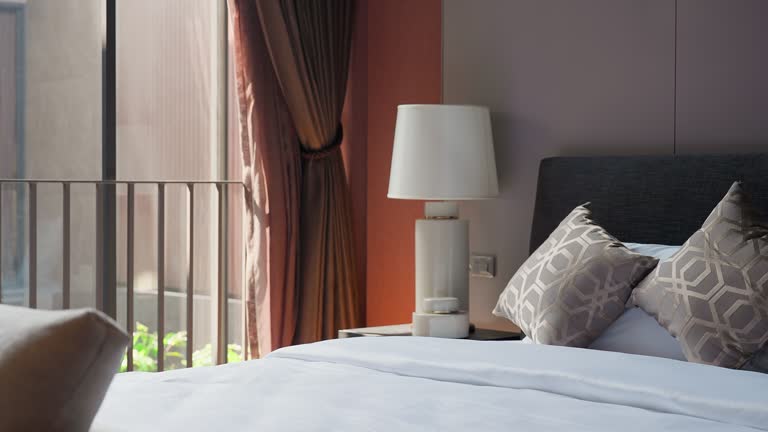 bedroom interior concept Close-up of pillow soft linens over a simplicity bedroom home interior background