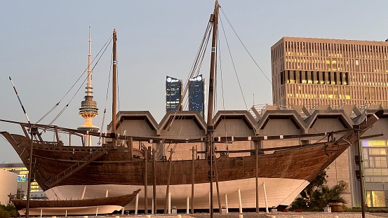 Kuwait City, Kuwait – December 27, 2023: A vessel in front of the National Museum in Kuwait city.