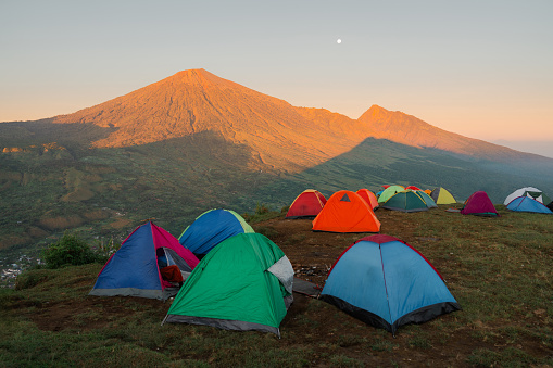 Group of tents on the background of mount Rinjani on Lombok island