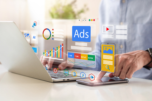 Digital marketing concept, Businessman using laptop with Ads dashboard digital marketing strategy analysis for branding. online advertisement, ad on website and social media. SEO. SMM.