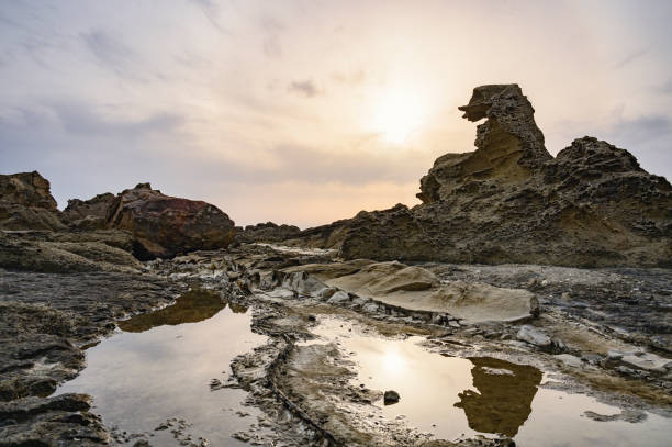 istock Godzilla-shaped rock on the Oga Peninsula 2098369153