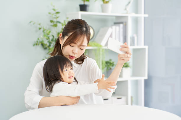 istock Mom takes smartphone away from child 2098380650