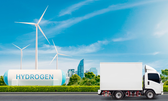Business Logistics Management with Hydrogen renewable energy production - hydrogen gas by wind turbine clean electricity for smart city and transportation. sustainable and good environment.