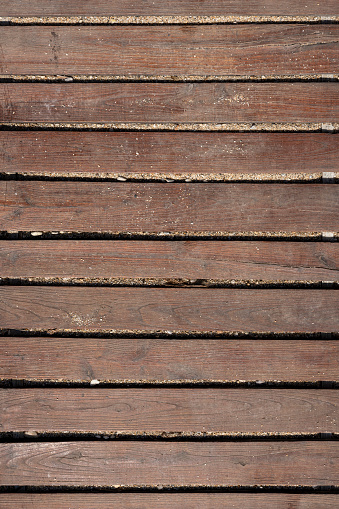 Wooden boardwalk. Wooden boards. Empty space, for text or logo.