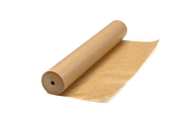 istock Large single roll of brown waxed baking paper isolated on white background 2098425725