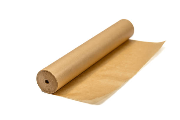 istock Isolated roll of waxed baking paper on white background 2098425732