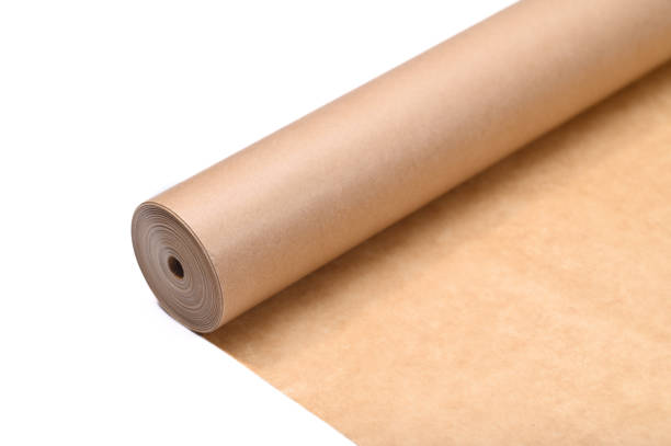 istock Roll of rolled brown paper isolated on white background 2098425747