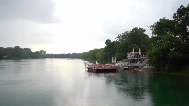 A raft cafe on a shore of lake in Bela Crkva, Serbia while it rains in summer