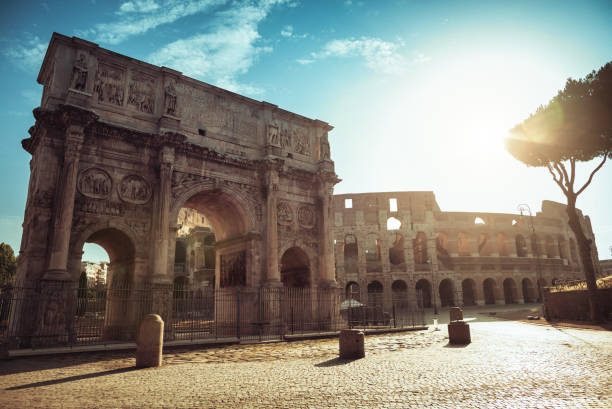 Coliseum of Rome with warm sun at early morning