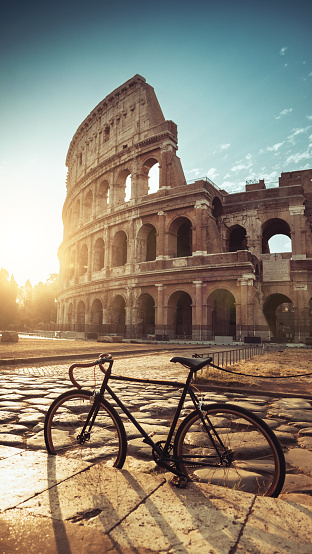 Coliseum of Rome with warm sun at early morning