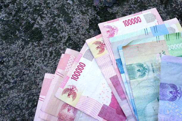 istock Indonesian money is arranged randomly with a vintage setting 2098528541