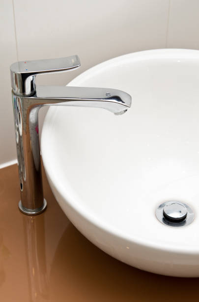 Modern bathroom chrome faucet, white tiles wall, water tap and sink with soap, cleanness concept, close water, saving natural recourses concept banner with copy space