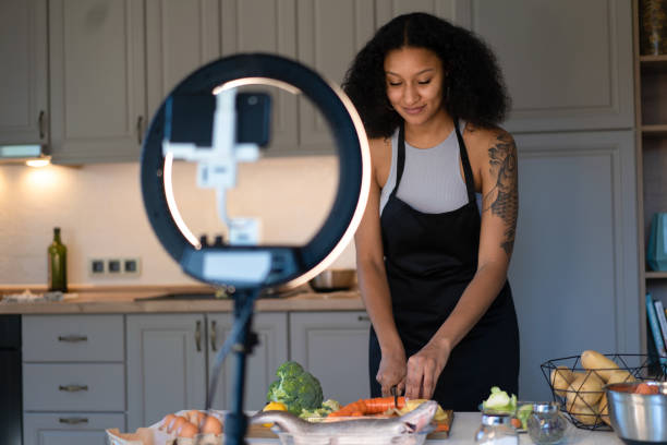 istock A vlogger recording a cooking lesson 2098539692