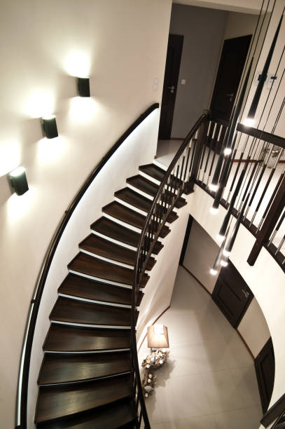 istock Spiral stairs in elegant modern home 2098554639