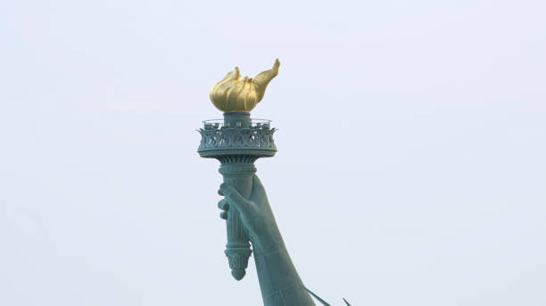 Close-up of golden torch held by Statue of Liberty in New York City, New York State, USA.