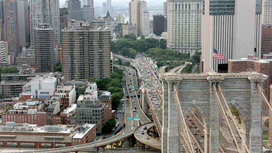 Aerial view of land vehicles moving on Brooklyn Bridge in New York City, New York State, USA.