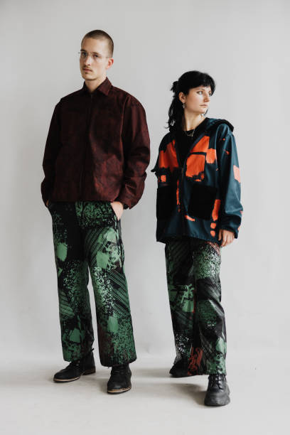 istock Two Cool Looking People Standing And Wearing Baggy Clothe 2098626024