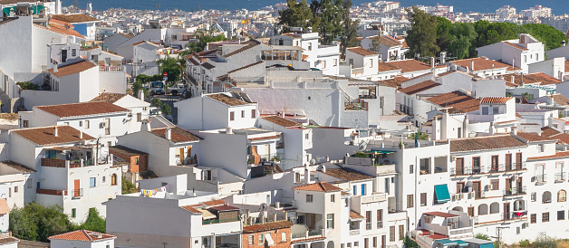 Panoramic view of the village of Frigiliana. White houses of Andalucia. Vacations in Malaga.