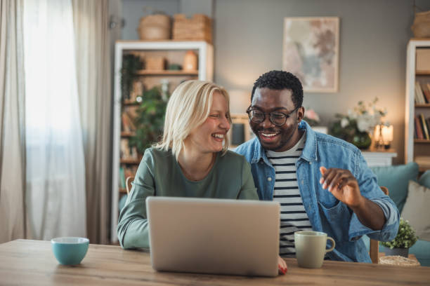 istock Happy multiethnic couple making a video call 2098681748