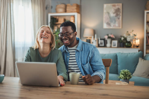 istock Happy multiethnic couple making a video call 2098681752