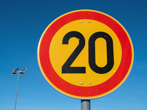 speed limit 20 sign on blue sky