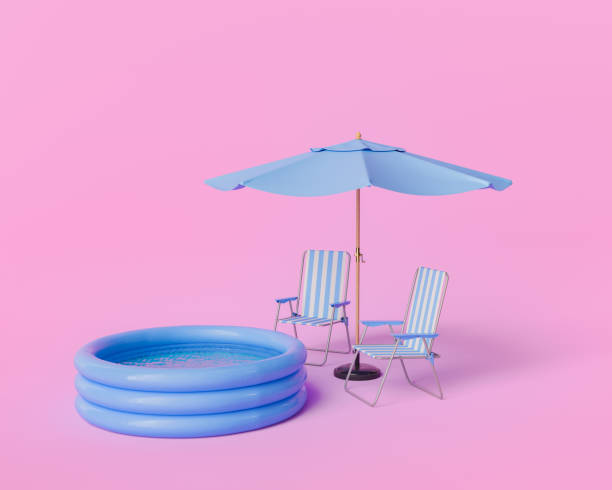 istock Inflatable Pool with Blue Umbrella and Striped Chairs on Pink Background 2098728466