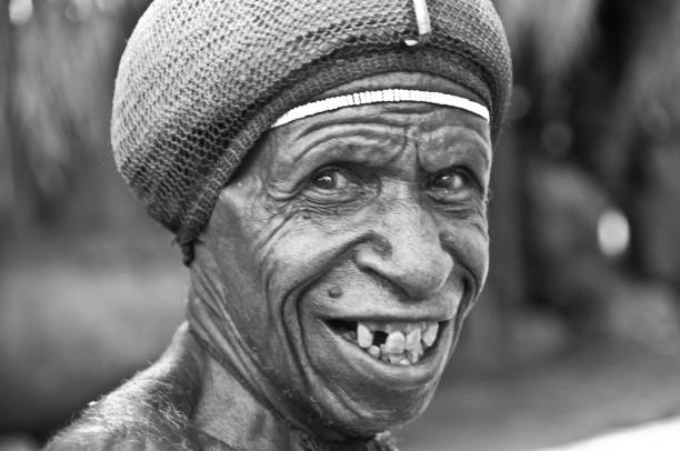 Baliem Valley, Wamena, West Papua, Indonesia - oct 30,2010 : close-up of a man from a Dani tribe, still relatively isolated, in  Dugum Hills, Baliem Valley, West Papua