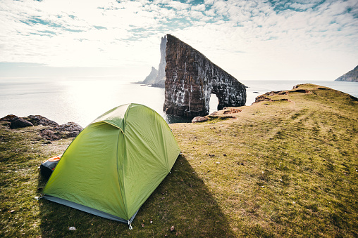 tent on the cliff at the faroe islands