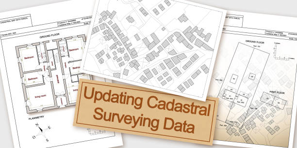 istock Updating public cadastral digital surveying databases and information about land registry - concept with an imaginary cadastral map of territory with buildings, roads and land parcel 2098819057