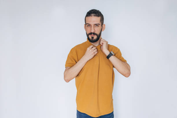 White t-shirt with space for print on yellow background