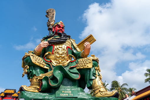 Statue of the god Guan Yu on Koh Samui, VFamous place for traveling. Religious arts and beliefs.