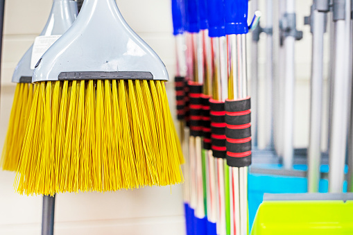 yellow brush for cleaning premises in a supermarket