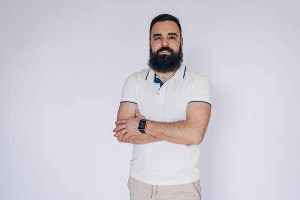 Confident portrait of a happy man on white background