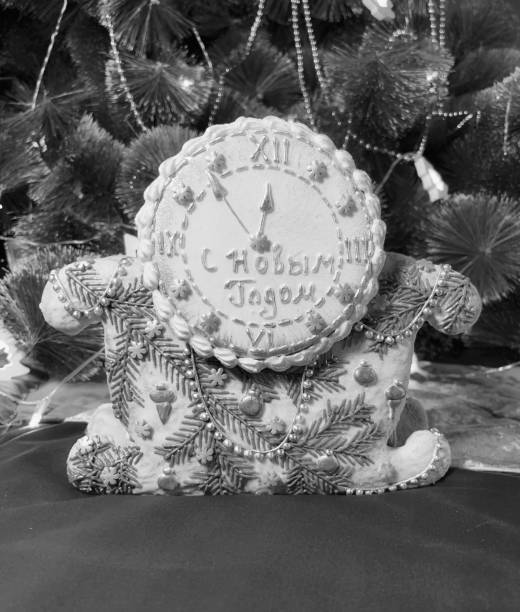 Festive New Year's Celebration Gingerbread Clock. A Handcrafted Edible Decoration Symbolizing the Countdown to the Holiday