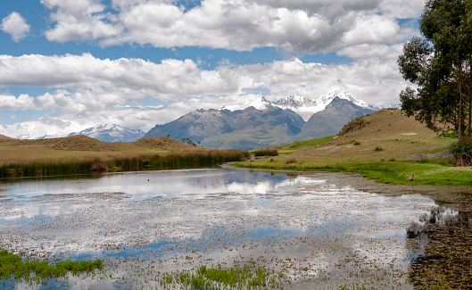 Lake Wilcacocha And A View Of The Mountain Range Above Huaraz In The Peruvian Andes