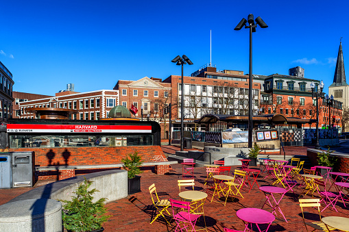 Cambridge, Massachusetts, USA - March 19, 2024: View of Harvard Square on a winter morning. Landmarks include the 