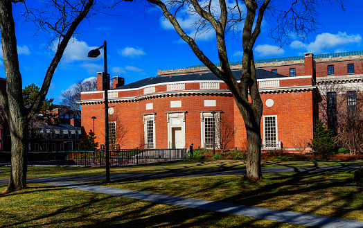Cambridge, Massachusetts, USA - March 19, 2024: The Houghton LIbrary building is in Harvard University's Harvard Yard. Opened in 1942, it is part of the Harvard College Library and is a repository for rare books and manuscripts.